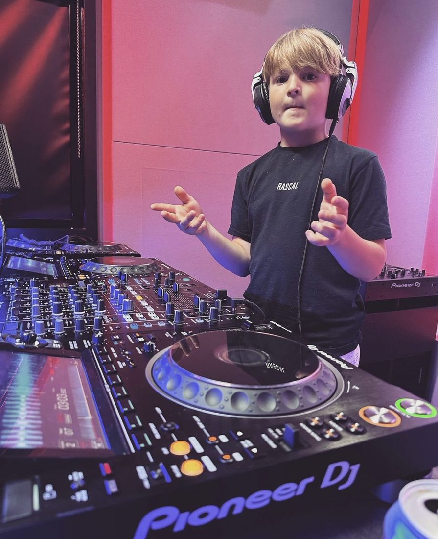 DJ Archie mixing on Pioneer decks